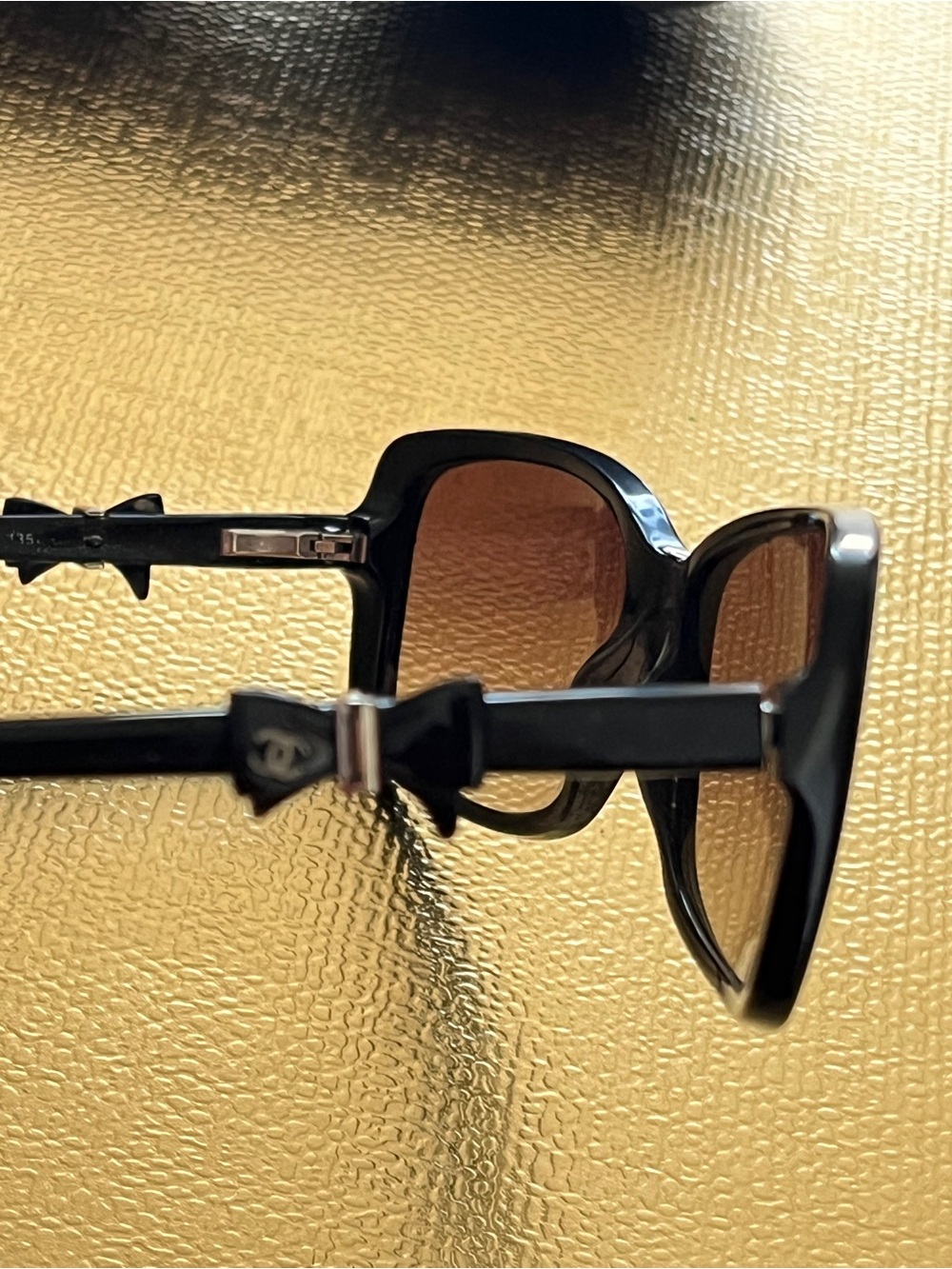 CHANEL Black Frame Sunglasses with Brown Gradient Lenses